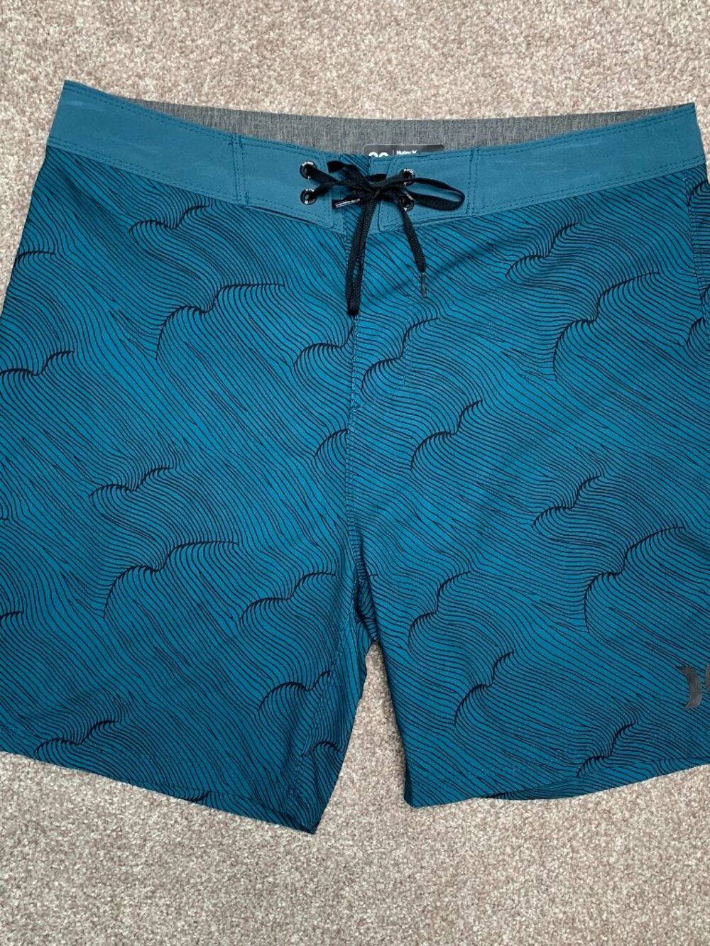 Hurley Men’s Board / Surf Shorts Size 30 - Teal color with wave design